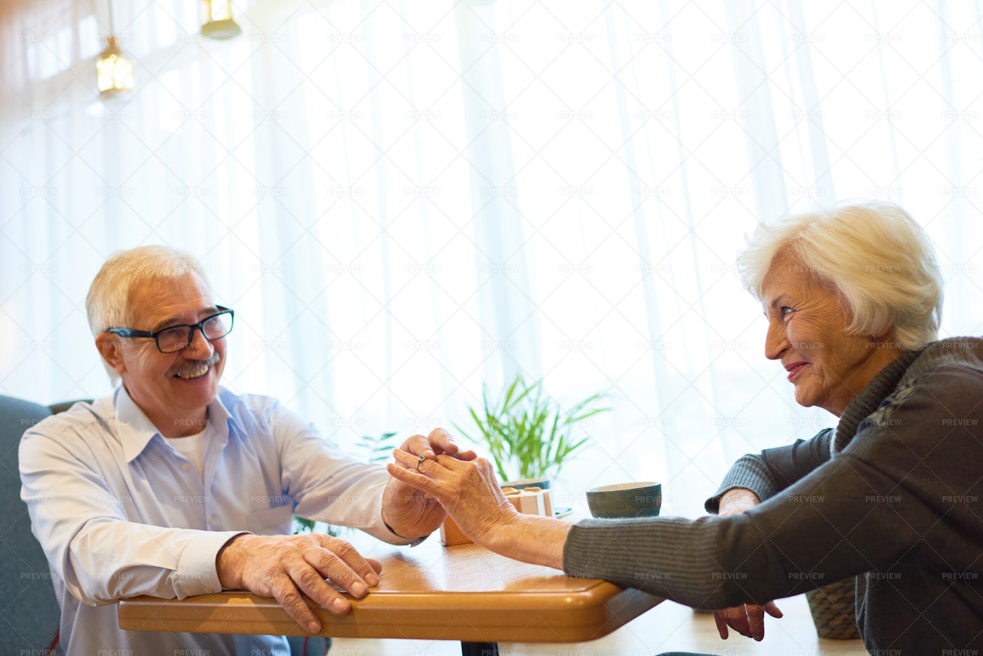Senior Couple Celebrating Momentous...: Stock Photos