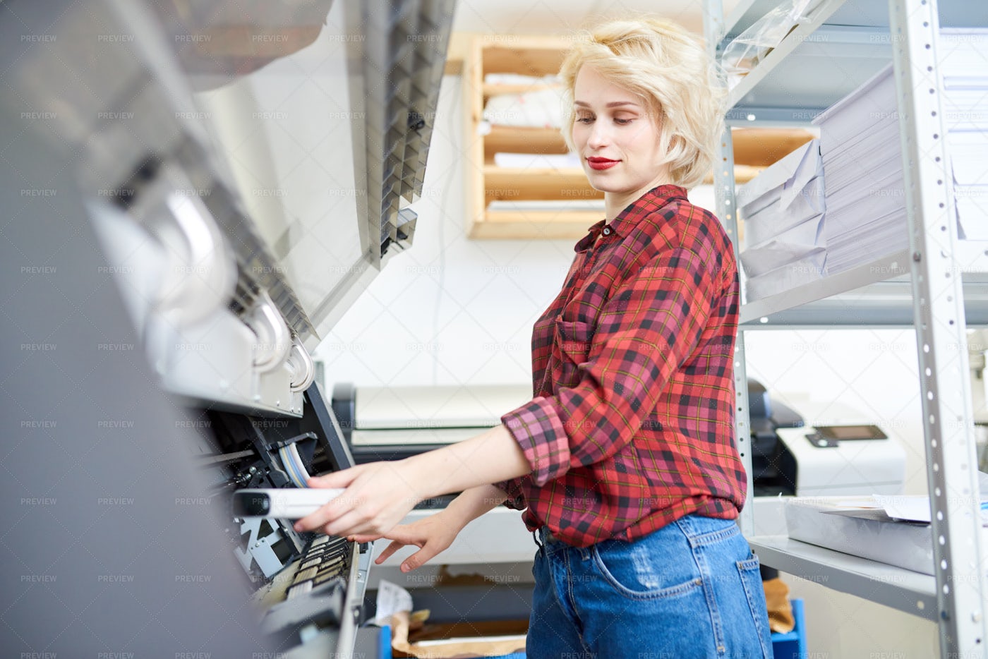 Young Woman Working With Plotter: Stock Photos