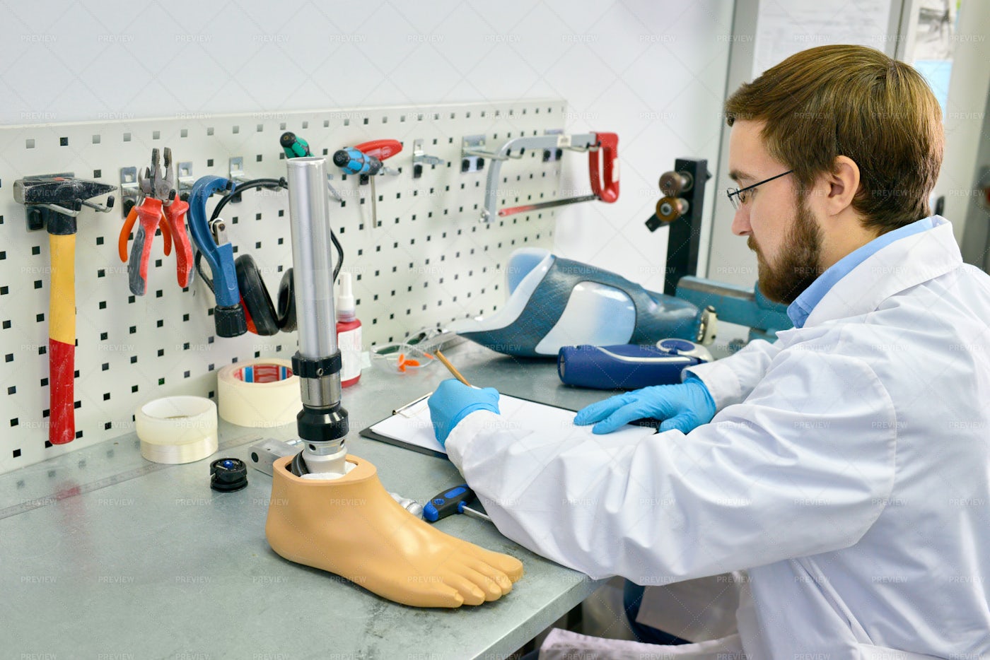 Prosthetist Working In Laboratory: Stock Photos