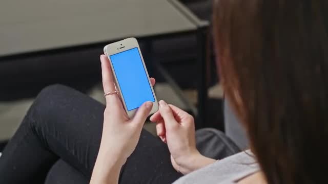 Woman Holding Smartphone: Stock Video