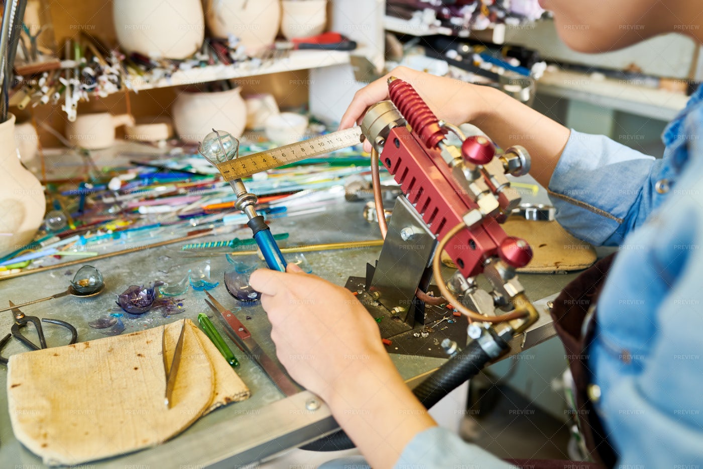 Artist Doing Lampwork In Studio: Stock Photos