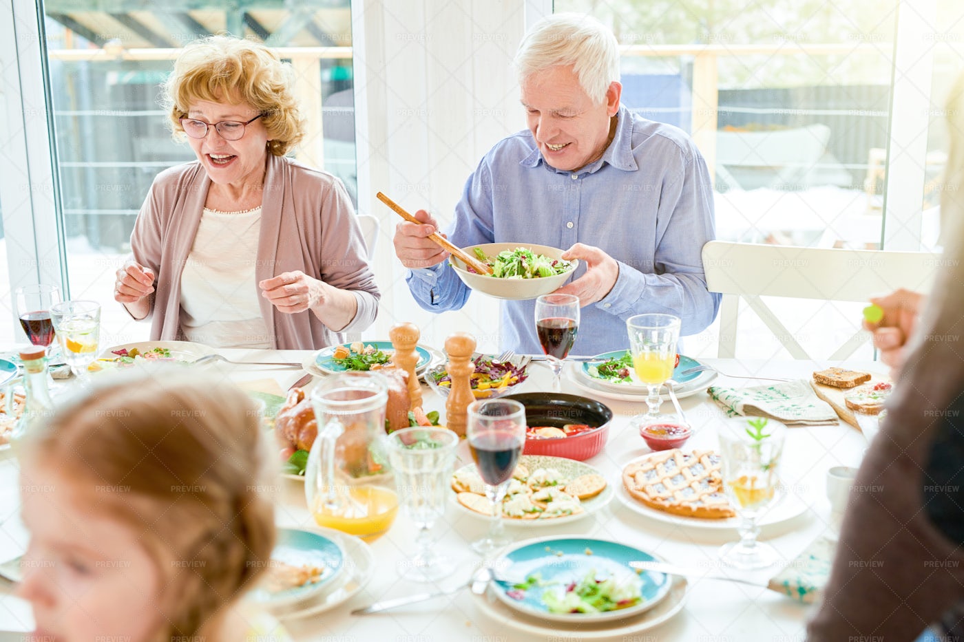 Grandparents Enjoying Food At...: Stock Photos