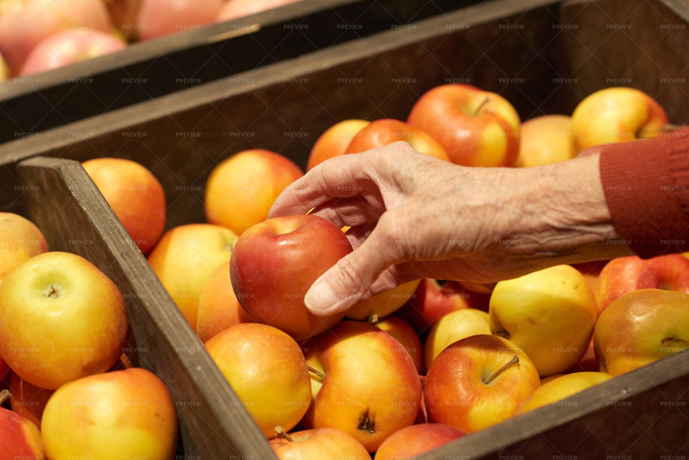 Hand Taking Apples In Supermarket: Stock Photos