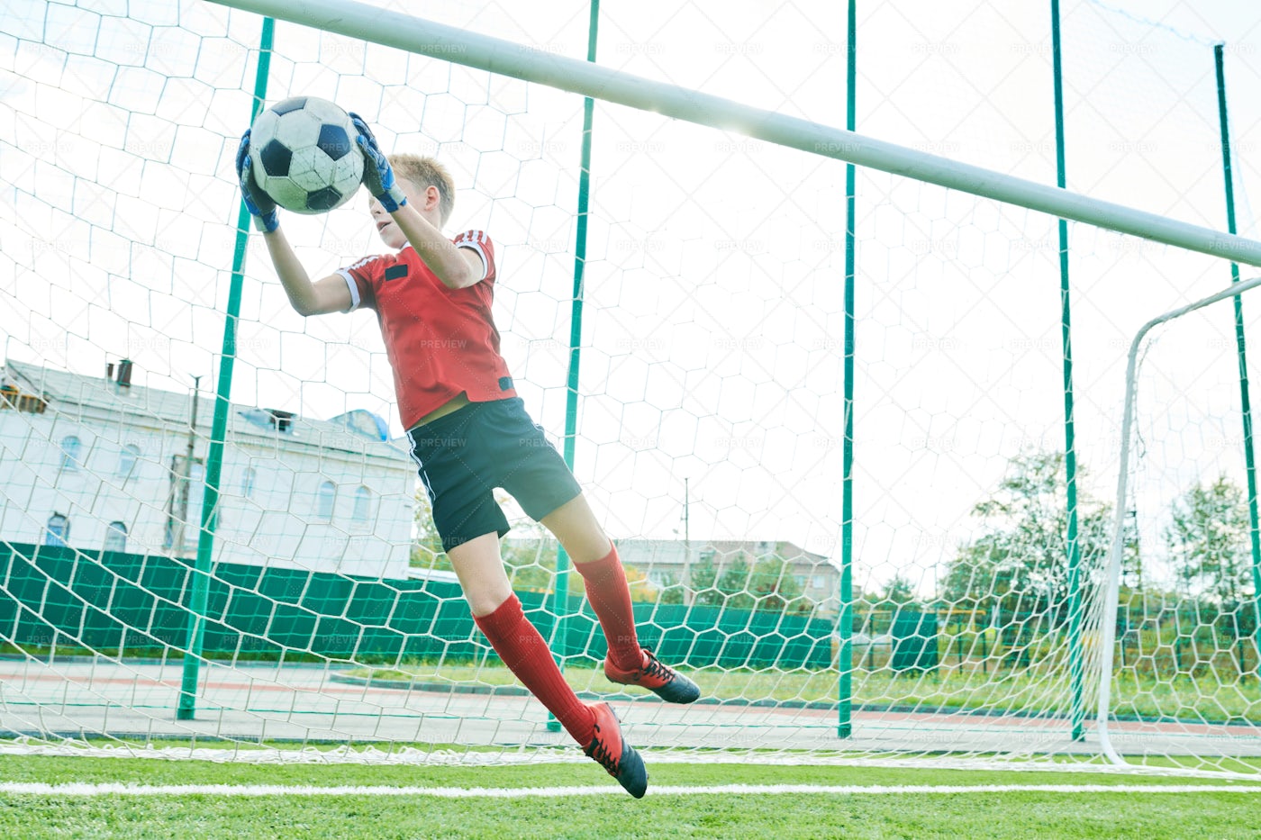 Boy Catching Ball: Stock Photos