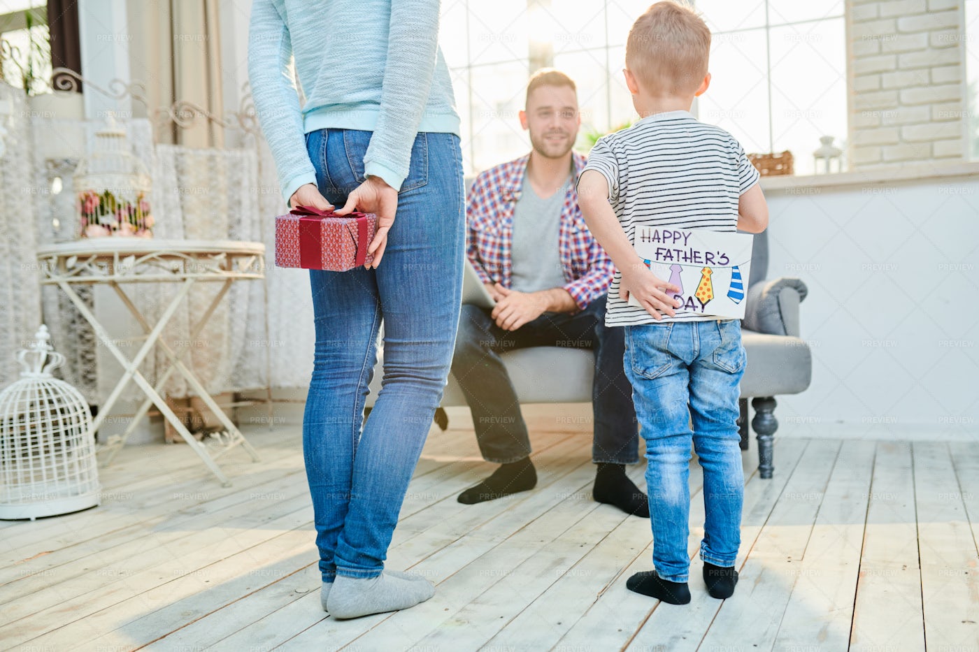 Young Family Celebrating Fathers...: Stock Photos