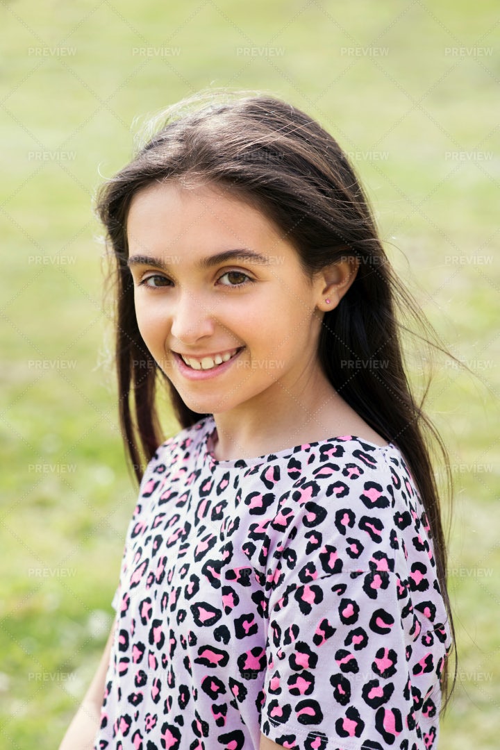 Young Girl Smiling Outdoors: Stock Photos