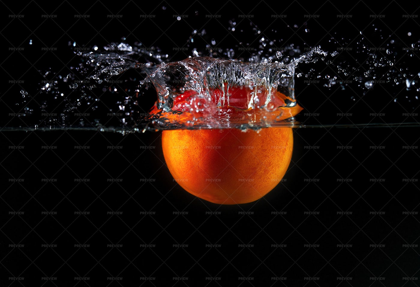 Falling Tomato Into Water: Stock Photos