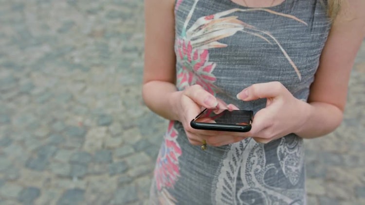 Young Lady on a Mobile Phone: Stock Video