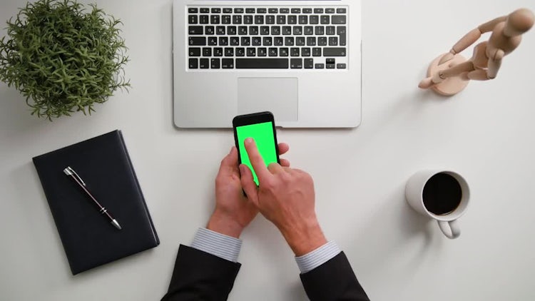 A Man Using A Phone With Green Screen: Stock Video