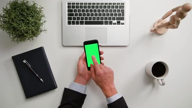 Man on a Phone with Green Screen: Stock Video