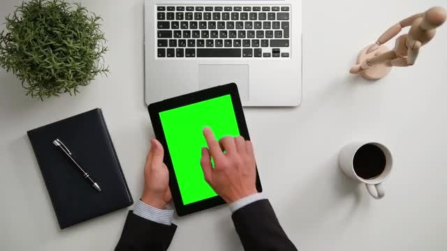 Hands Holding An iPad: Stock Video