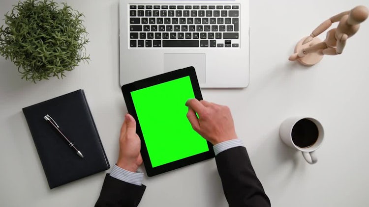 Man on a iPad with Green Screen: Stock Video