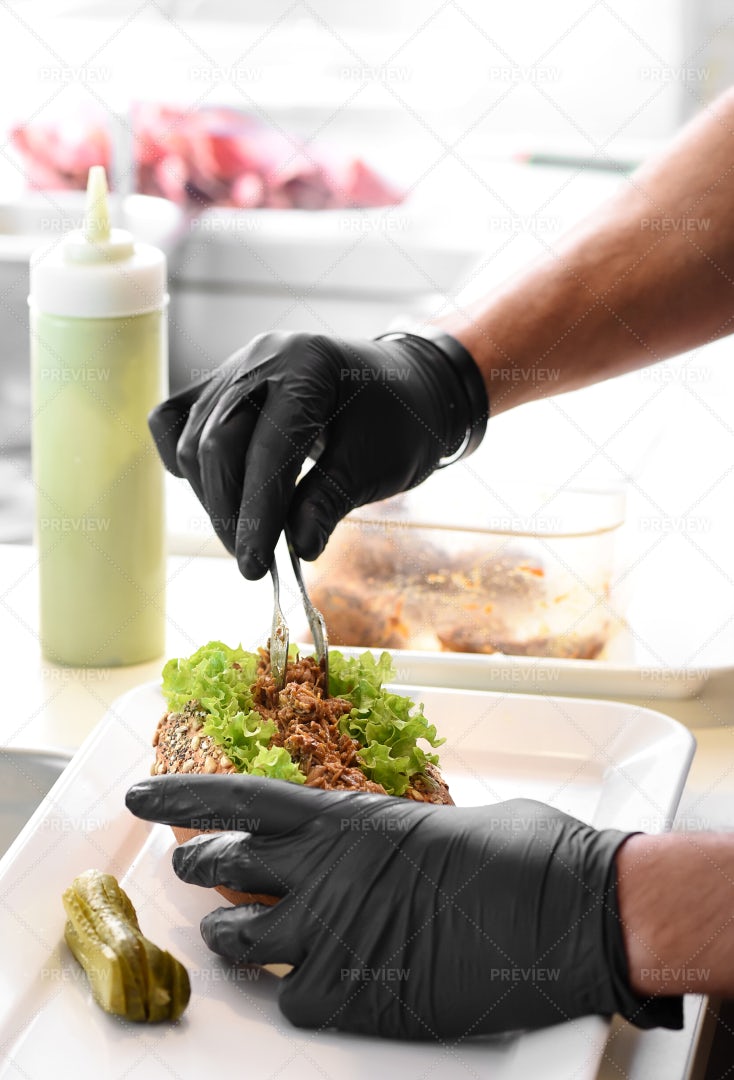 Chef Preparing Pork Sandwich: Stock Photos