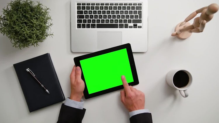 Man on a iPad with Green Screen: Stock Video