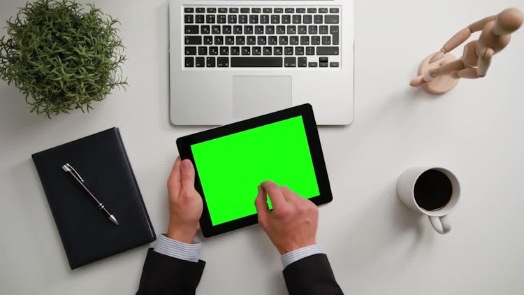 Man on a iPad with Green Screen: Stock Video