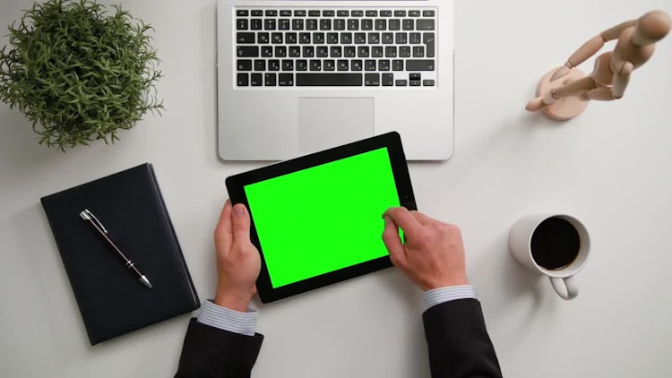 Man Holding An iPad With Green Screen: Stock Video