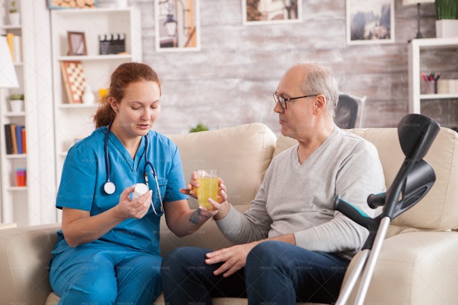 Old Man Taking Medicine - Stock Photos | Motion Array