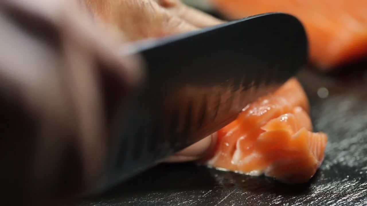 Chef Slicing Salmon Stock Video Motion Array