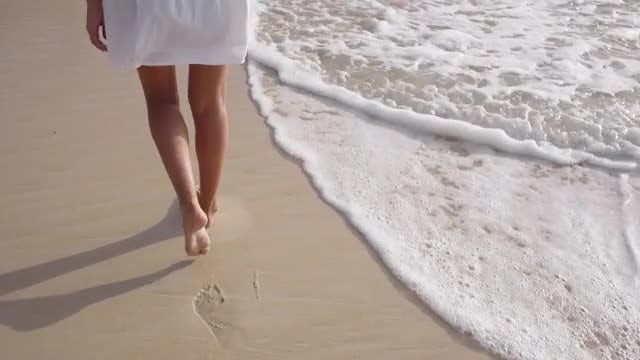 Footprints In The Sand: Stock Video