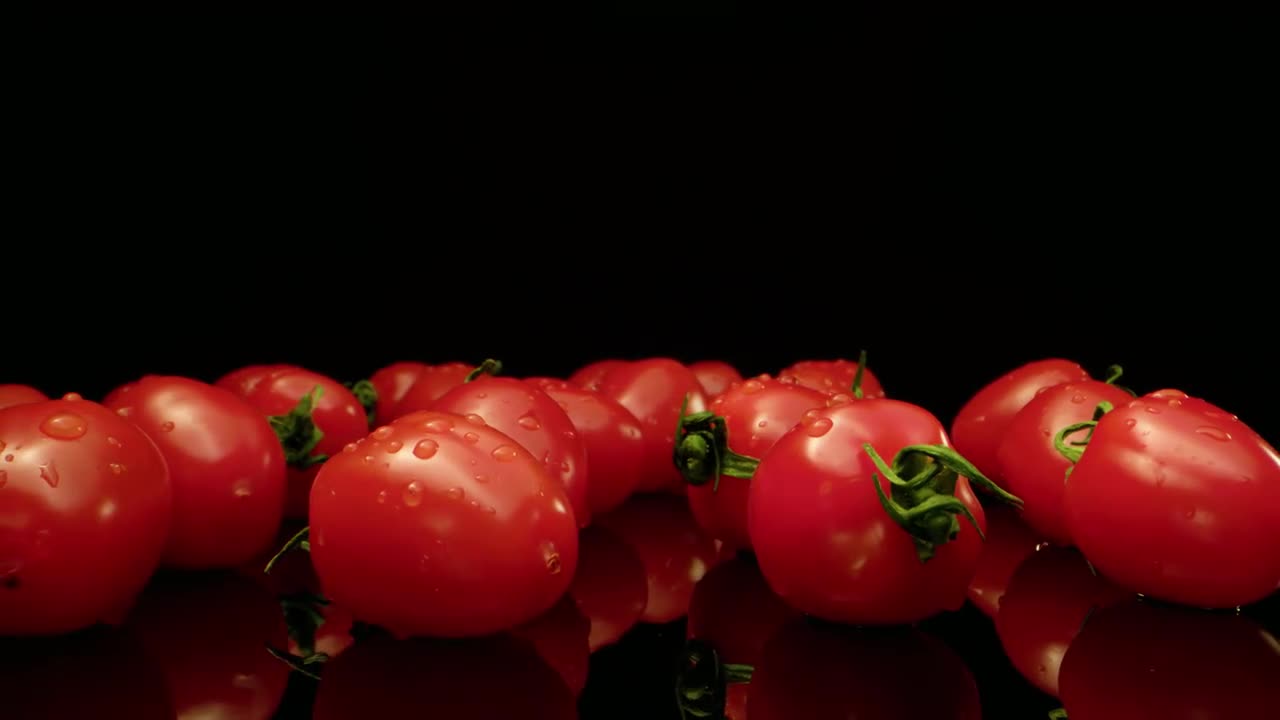 Tomatoes On Reflective Surface - Stock Video | Motion Array