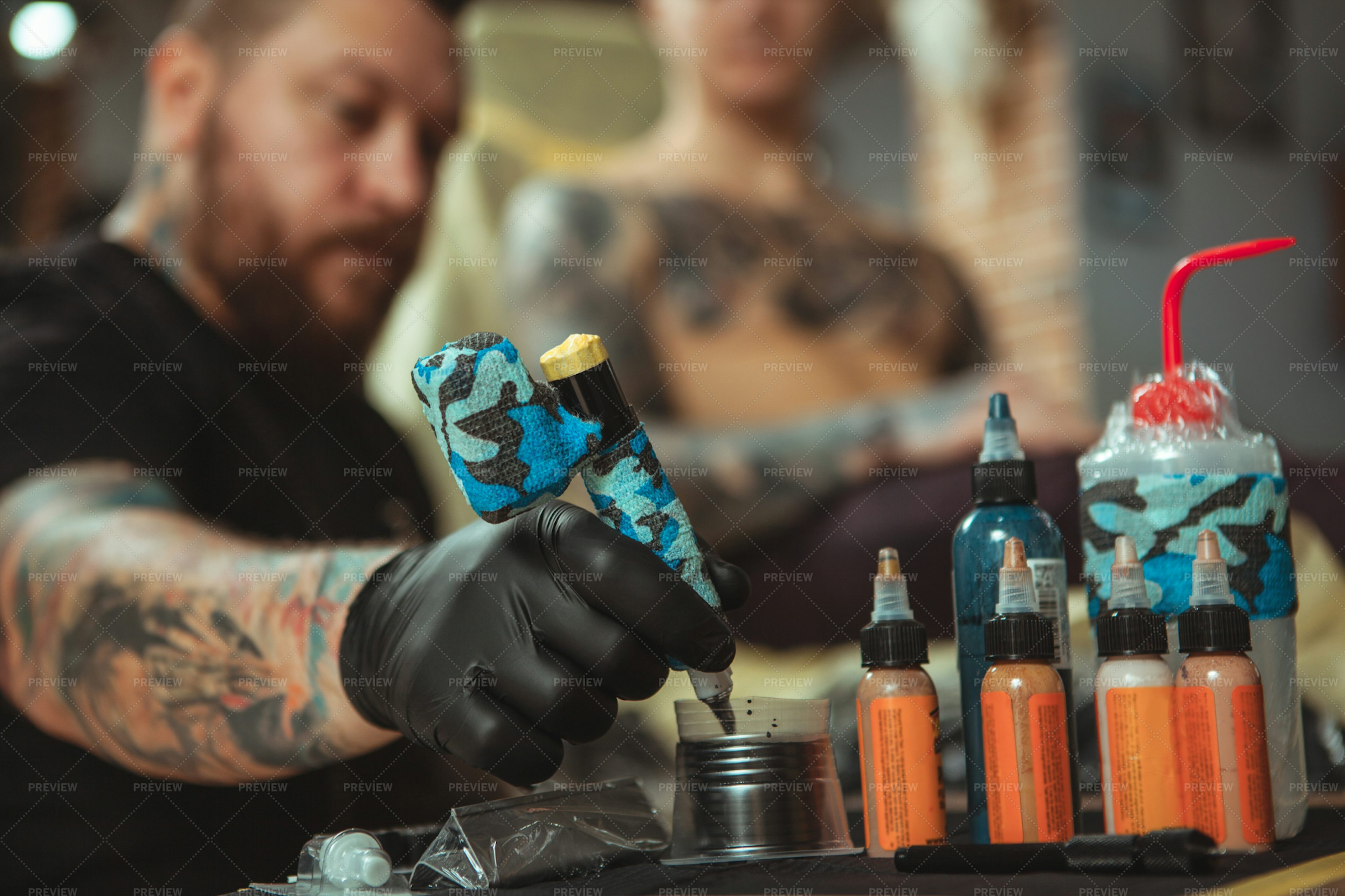 Tattooist Using Black Ink - Stock Photos | Motion Array