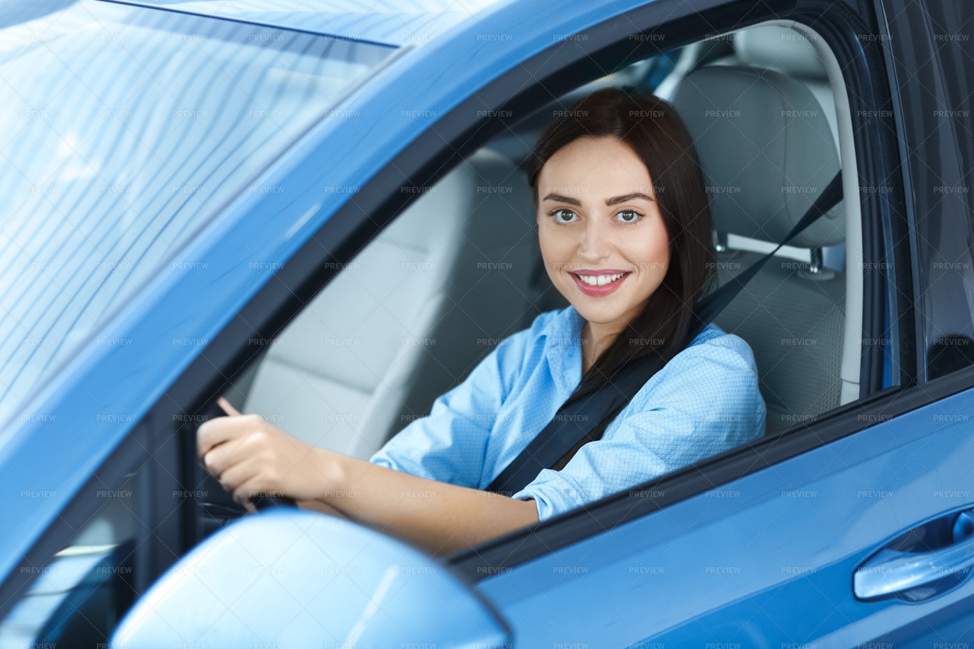 Woman Driving A New Car: Stock Photos