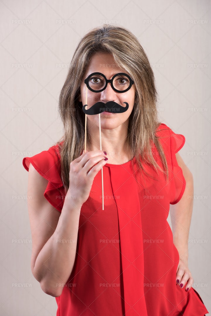 Holding Funny Mustache: Stock Photos