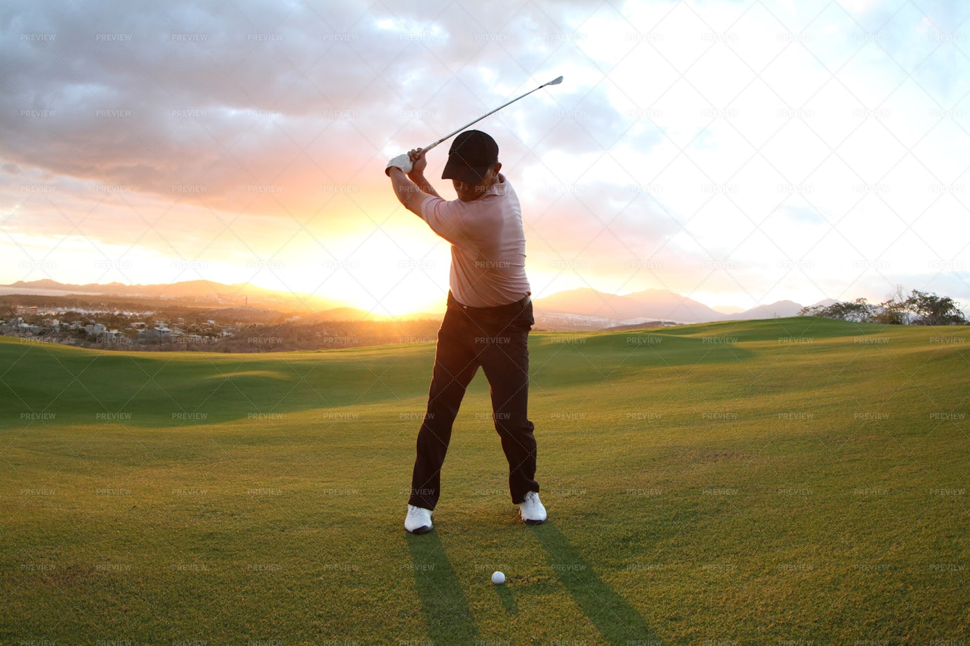Teeing Off At Sunset: Stock Photos