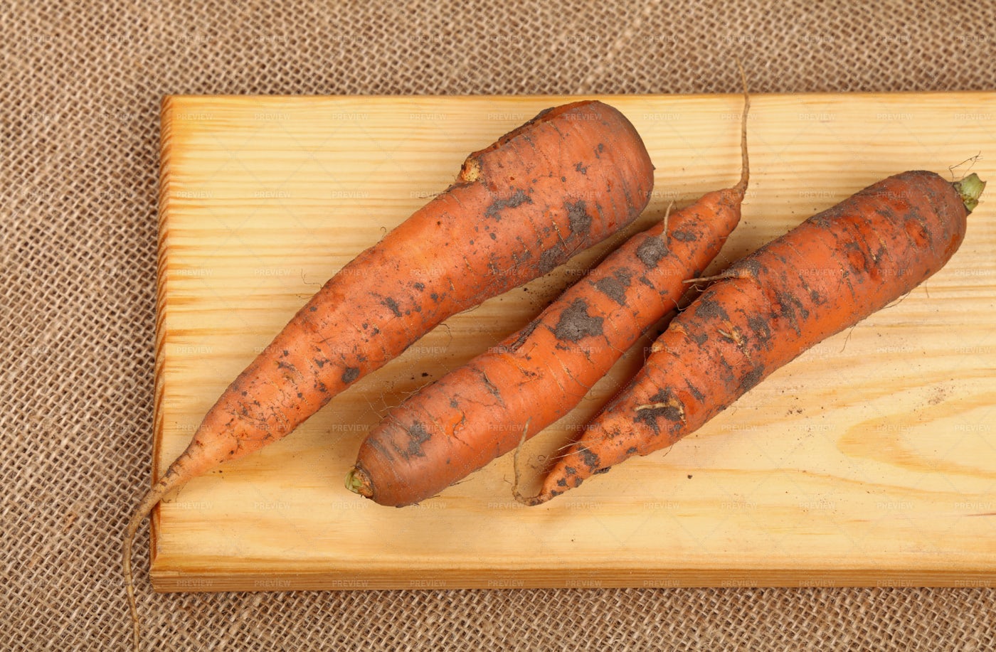 Raw Dirty Carrots: Stock Photos