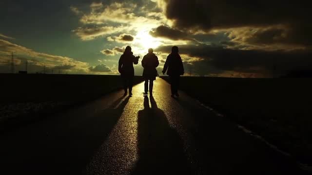 People Silhouette on Road: Stock Video