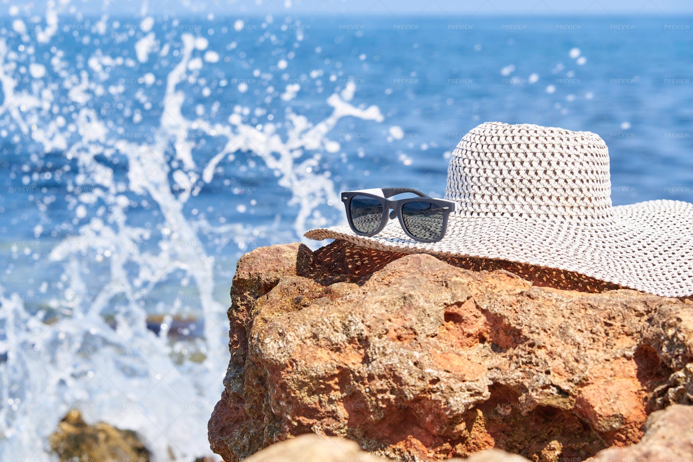Hat And Sunglasses On The Beach: Stock Photos