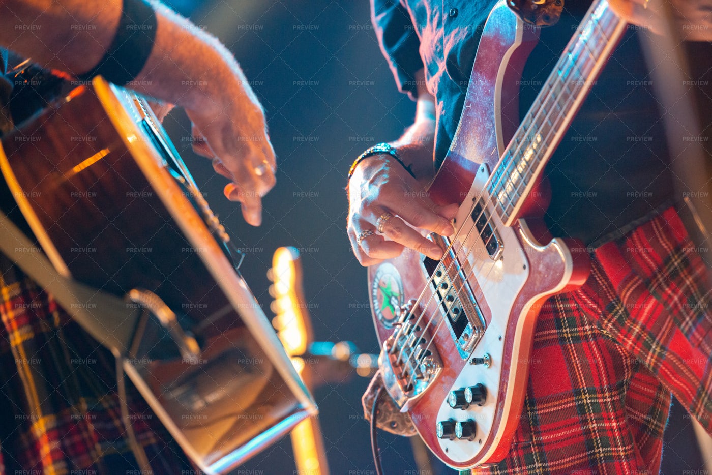 Guitarists Playing Together: Stock Photos
