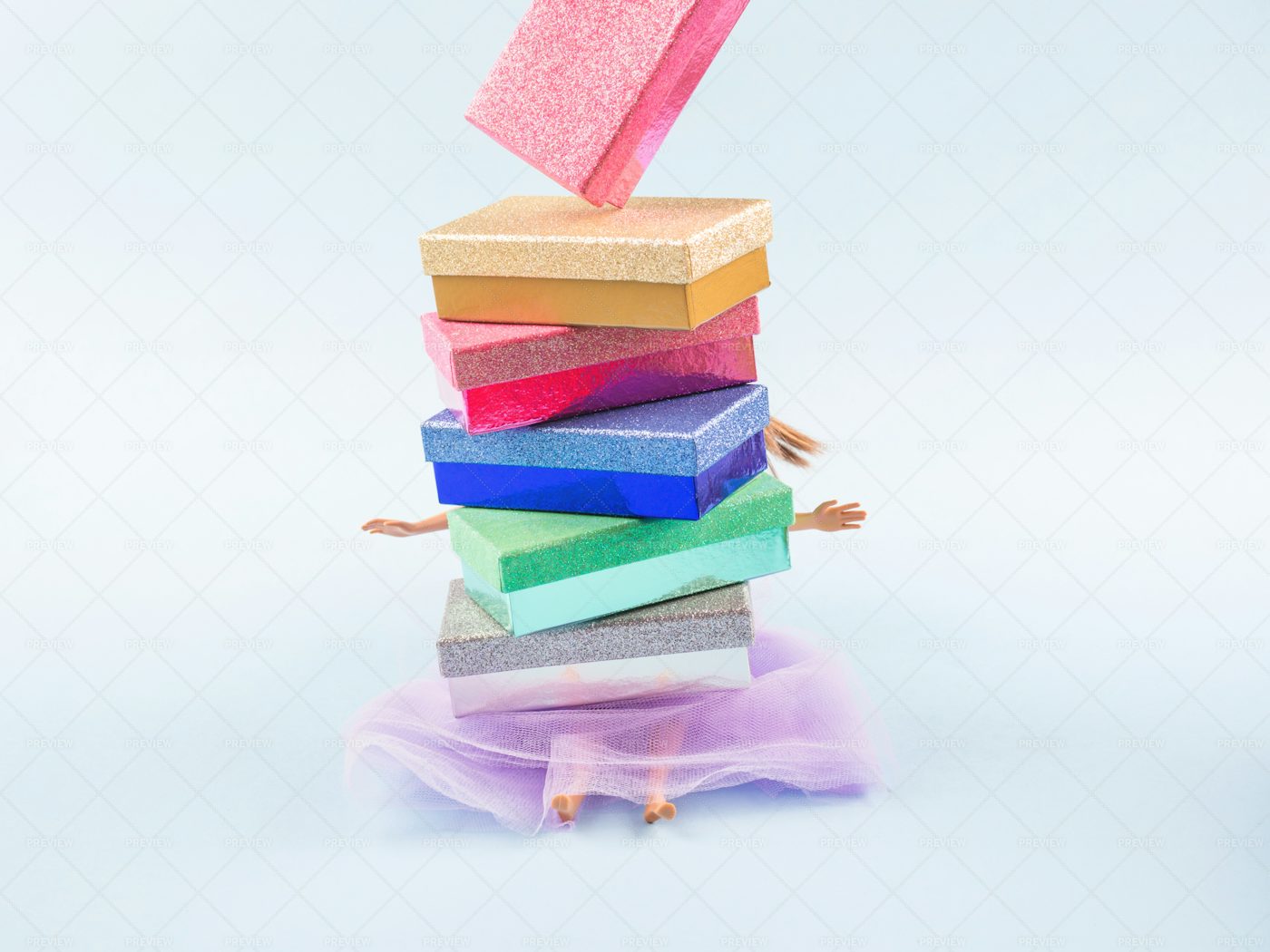 Doll Under Gifts: Stock Photos