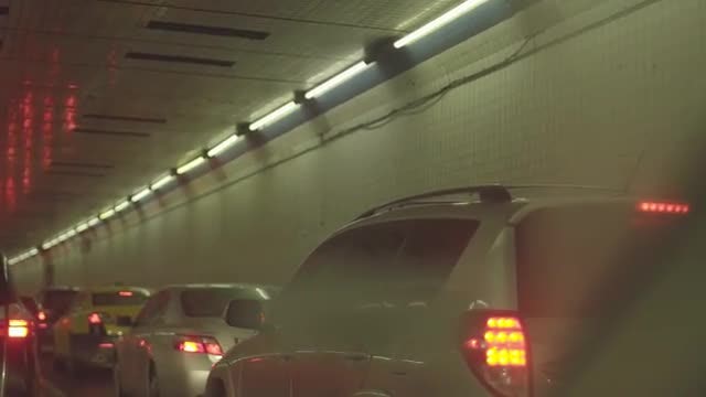 Slow Car Taillights Stuck in Traffic In Busy Tunnel: Stock Video