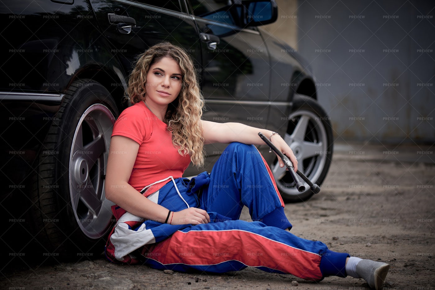 Sitting Beside Her Car: Stock Photos
