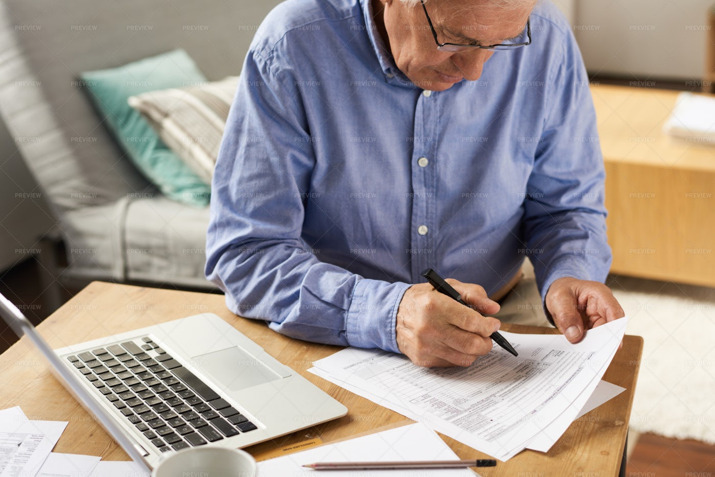 Senior Man Filling Application Form...: Stock Photos