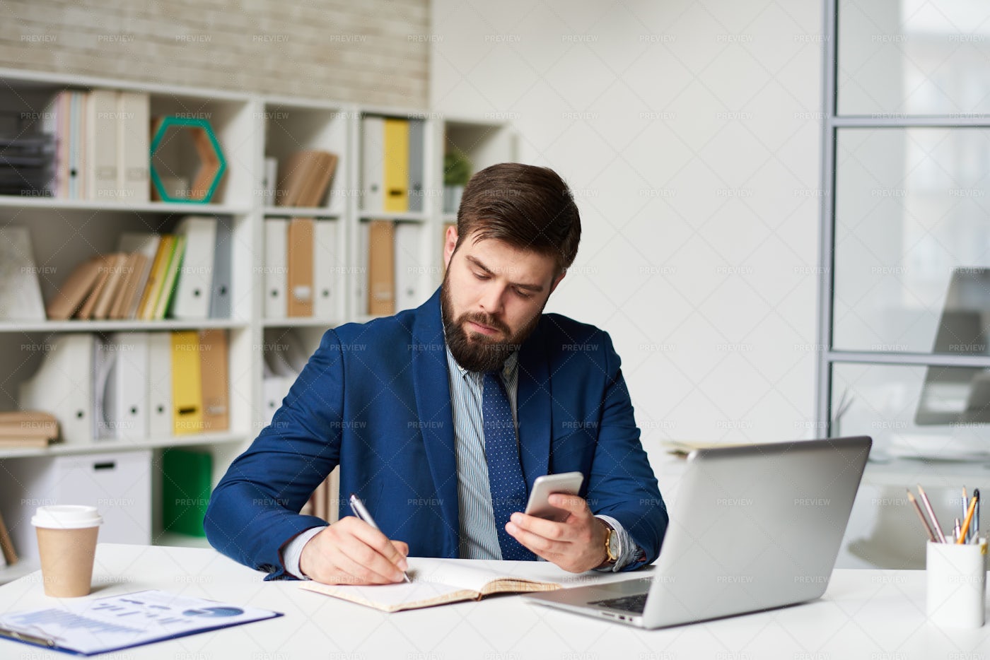 Modern Businessman Working In...: Stock Photos