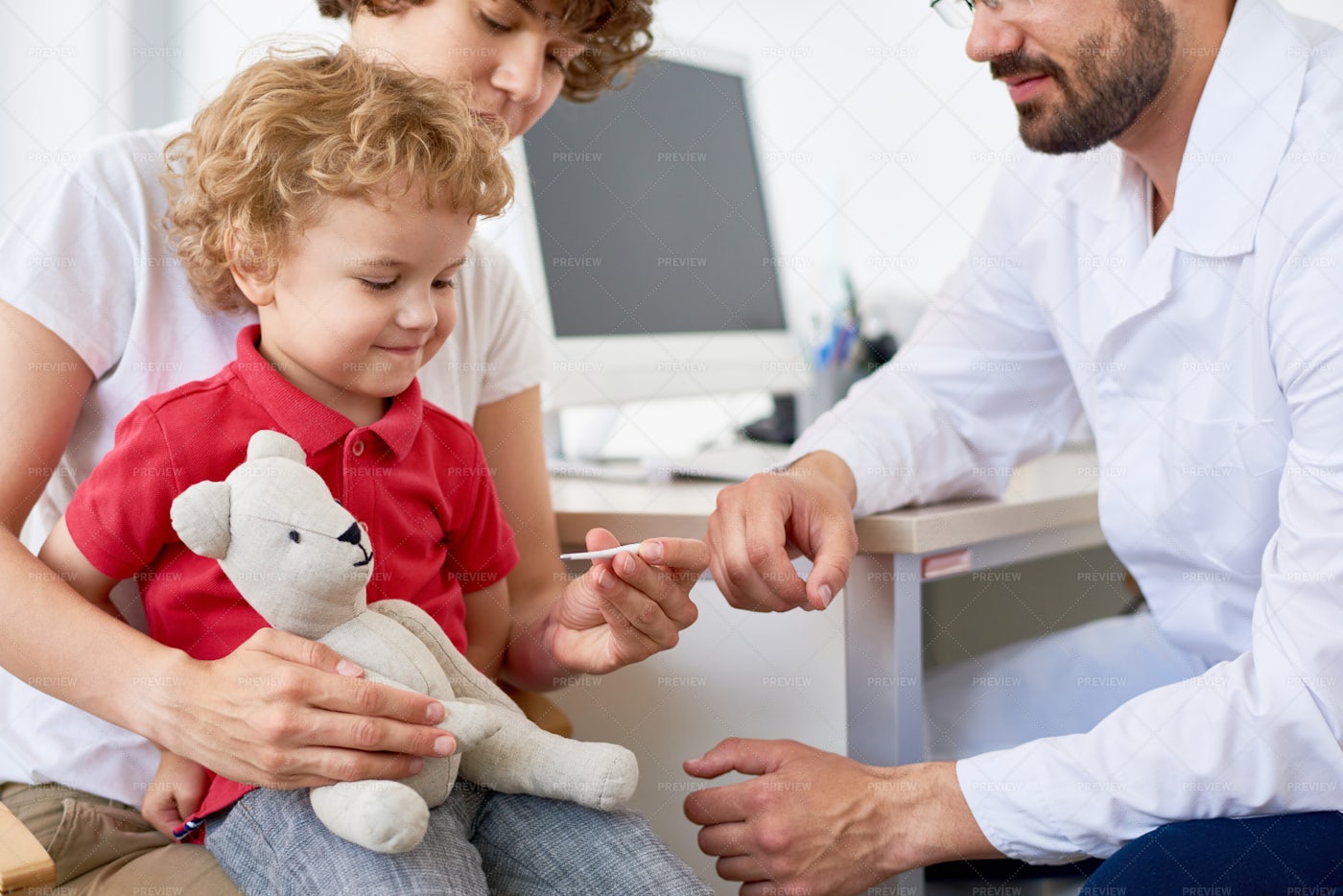 Checking Temperature Of Little Son: Stock Photos