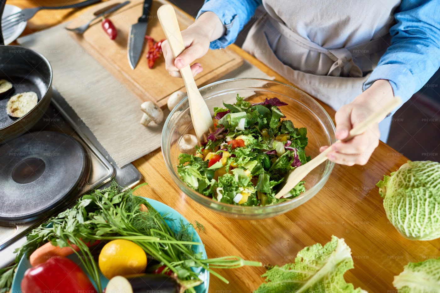 Housewife Making Salad Close Up: Stock Photos
