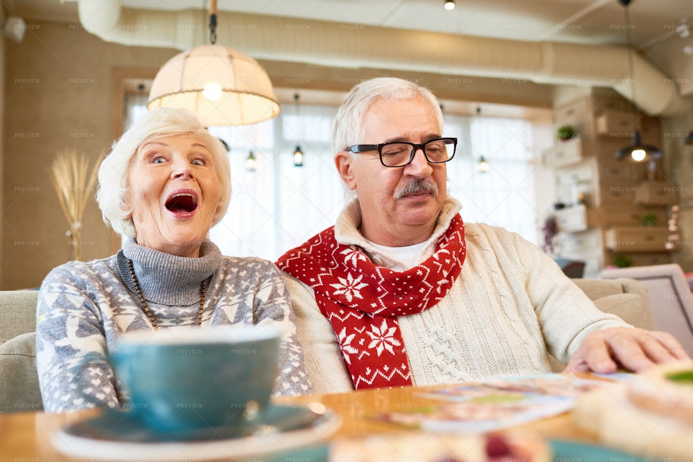 Portrait Of Senior Couple In Cafe: Stock Photos