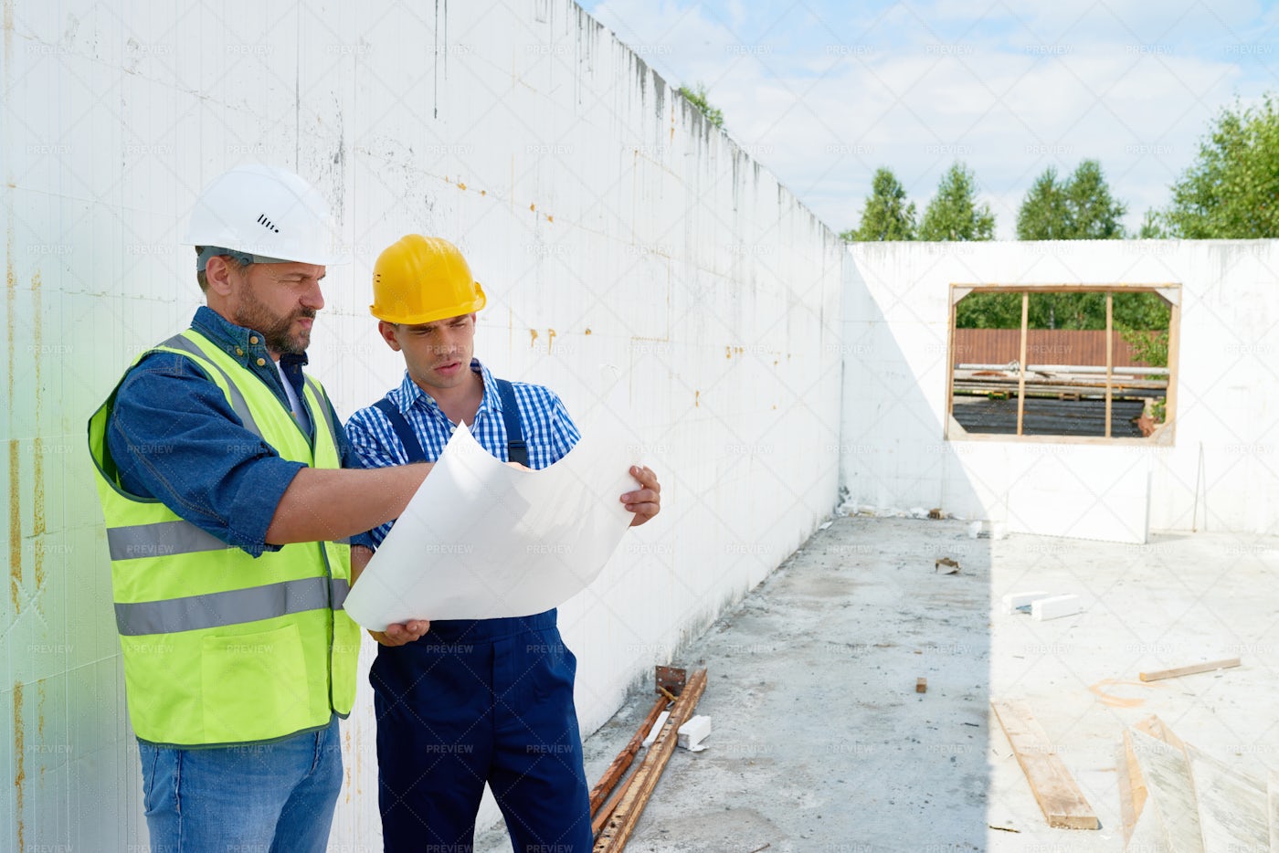 Construction Worker Discussing...: Stock Photos