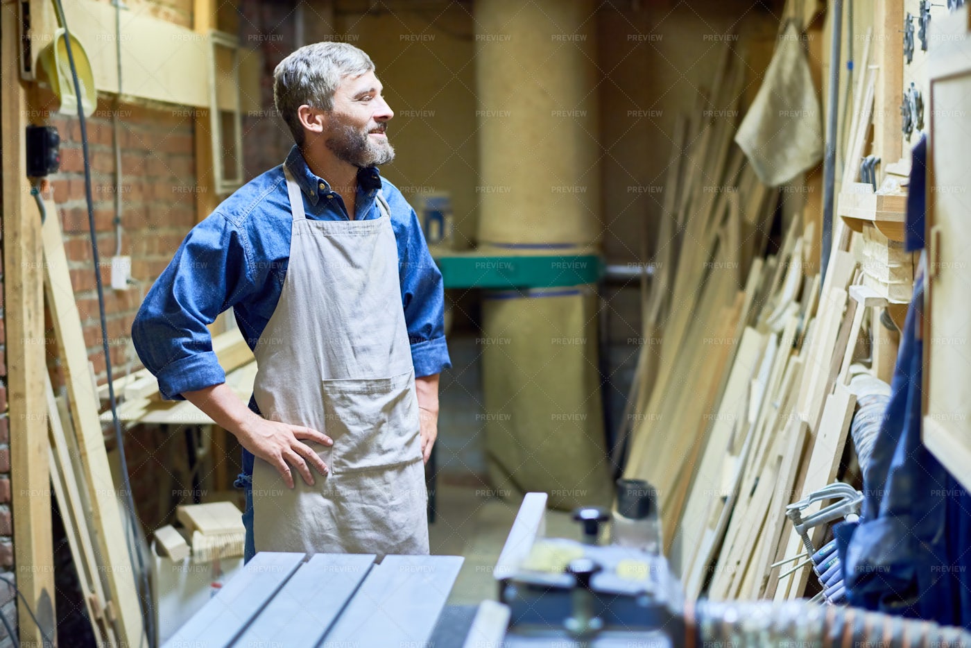 Bearded Carpenter In Storage Room: Stock Photos