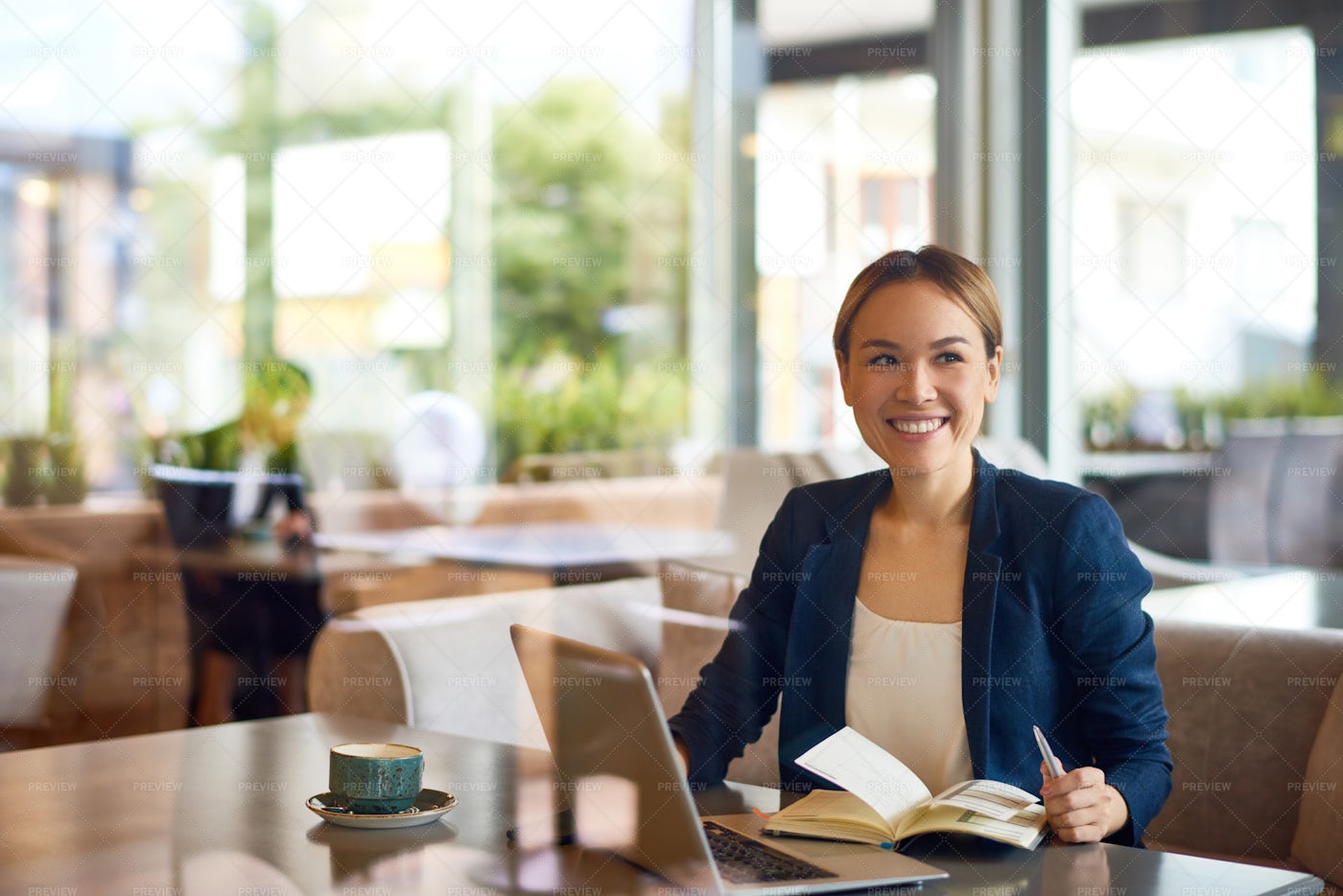 Asian Business Woman Working At Cafe: Stock Photos