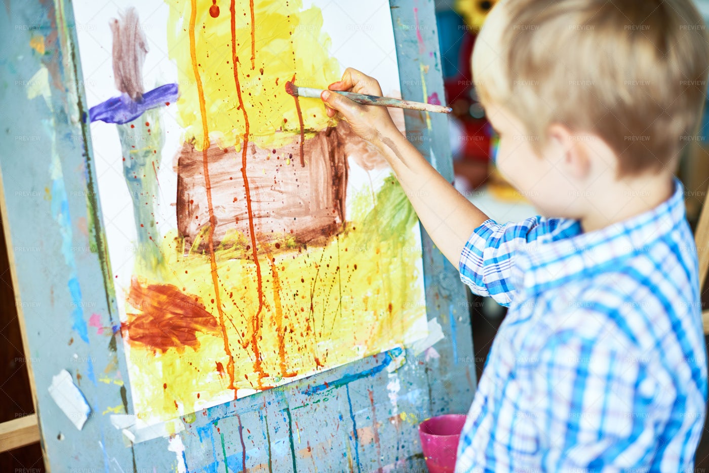 Little Boy Painting In Art Therapy: Stock Photos