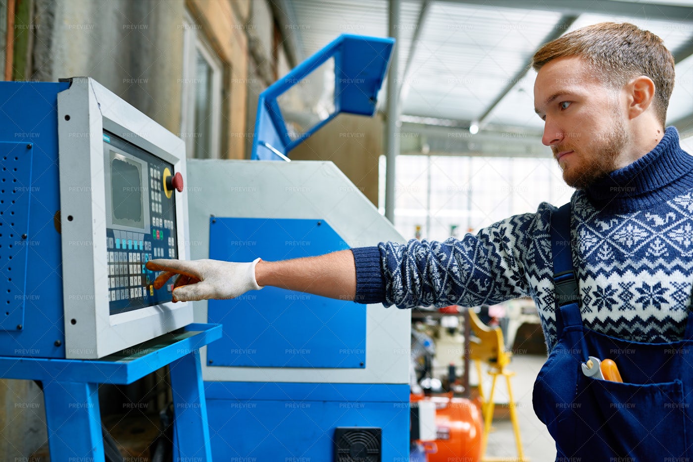 Modern Machine Operator At Factory: Stock Photos