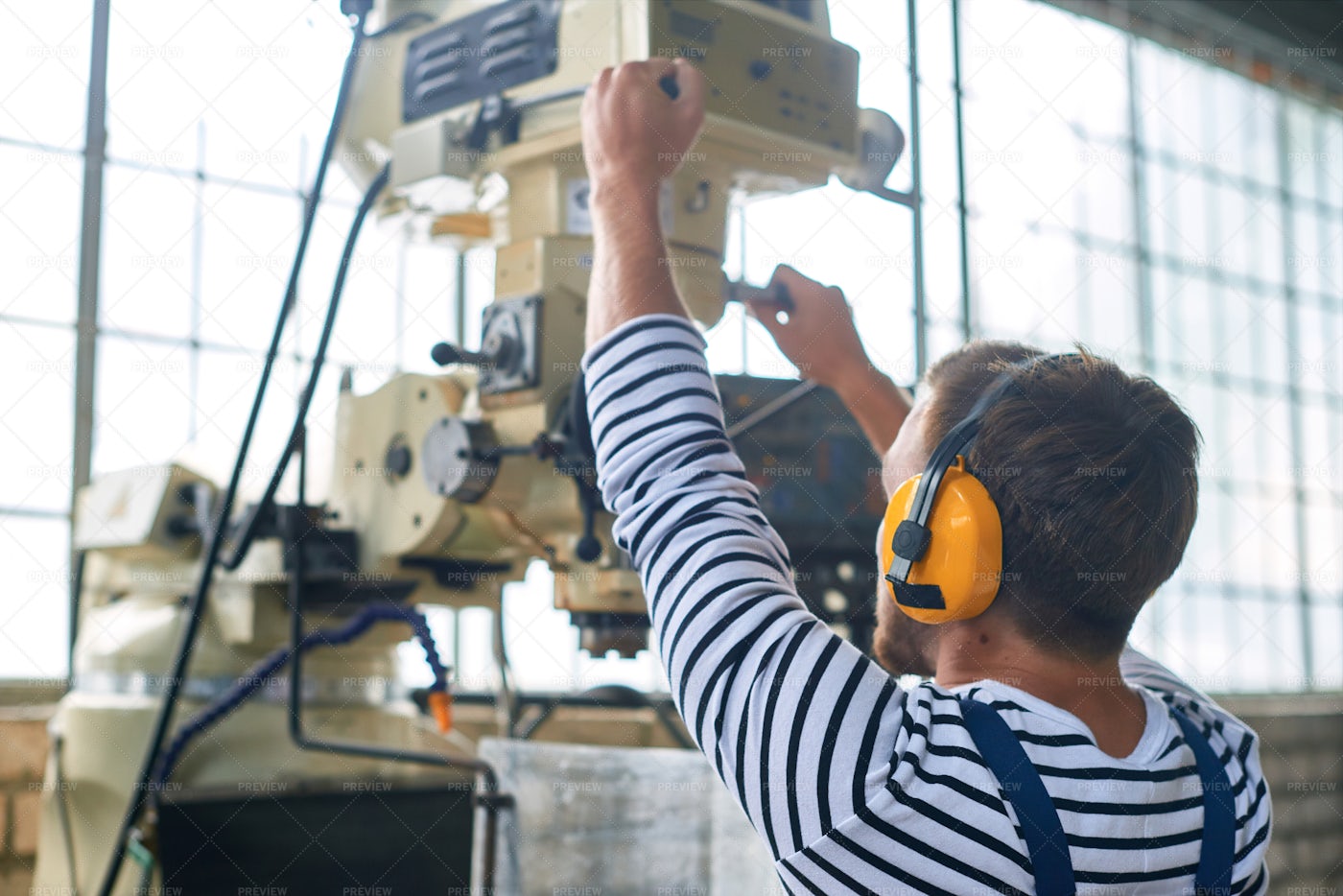 Worker Operating Machine Units: Stock Photos