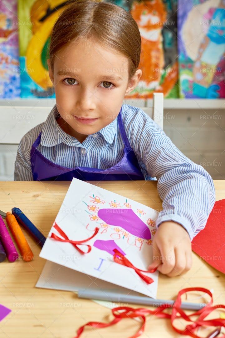 Cute Girl Making Handmade Card For...: Stock Photos