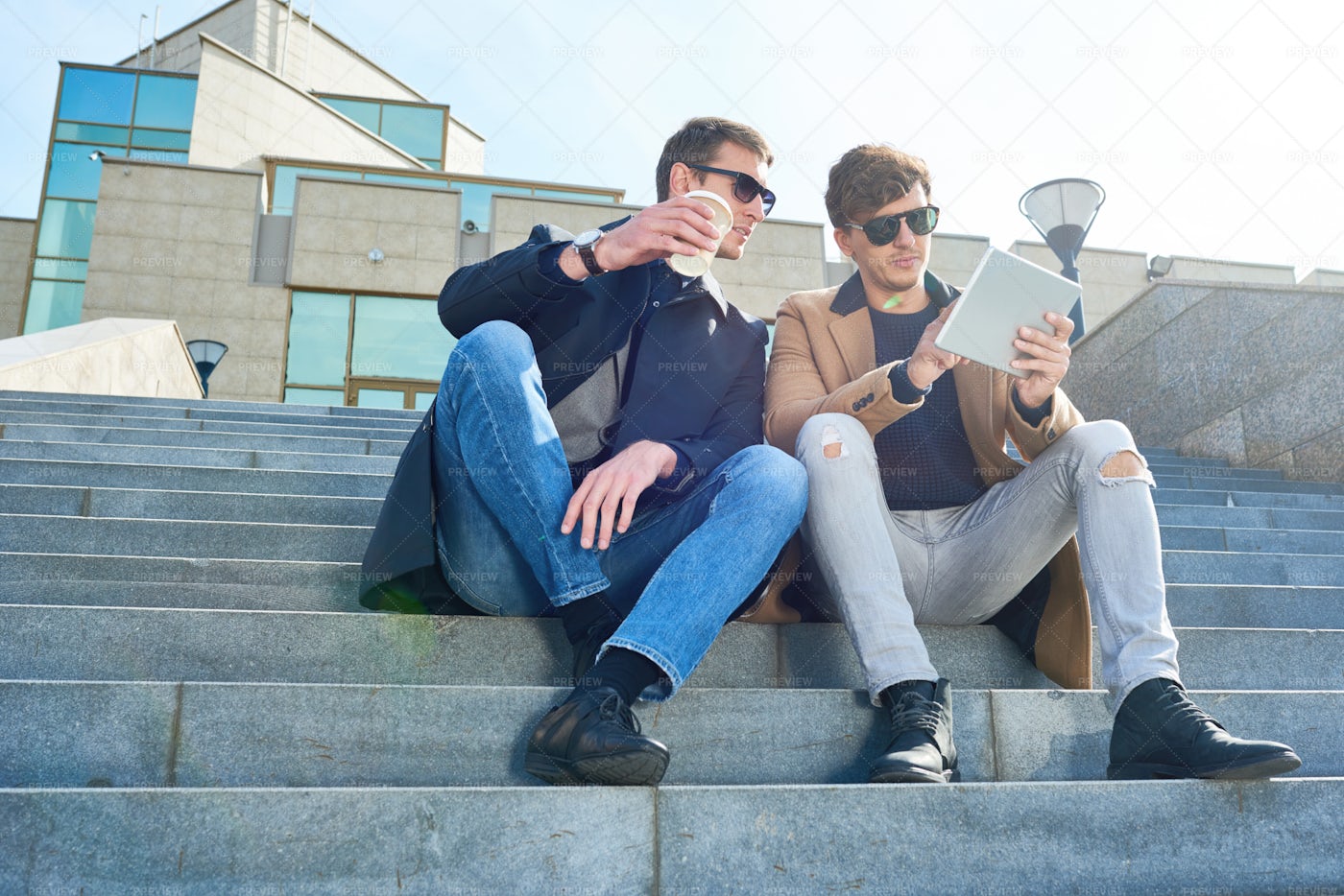 Modern Young Men Using Tablet In...: Stock Photos