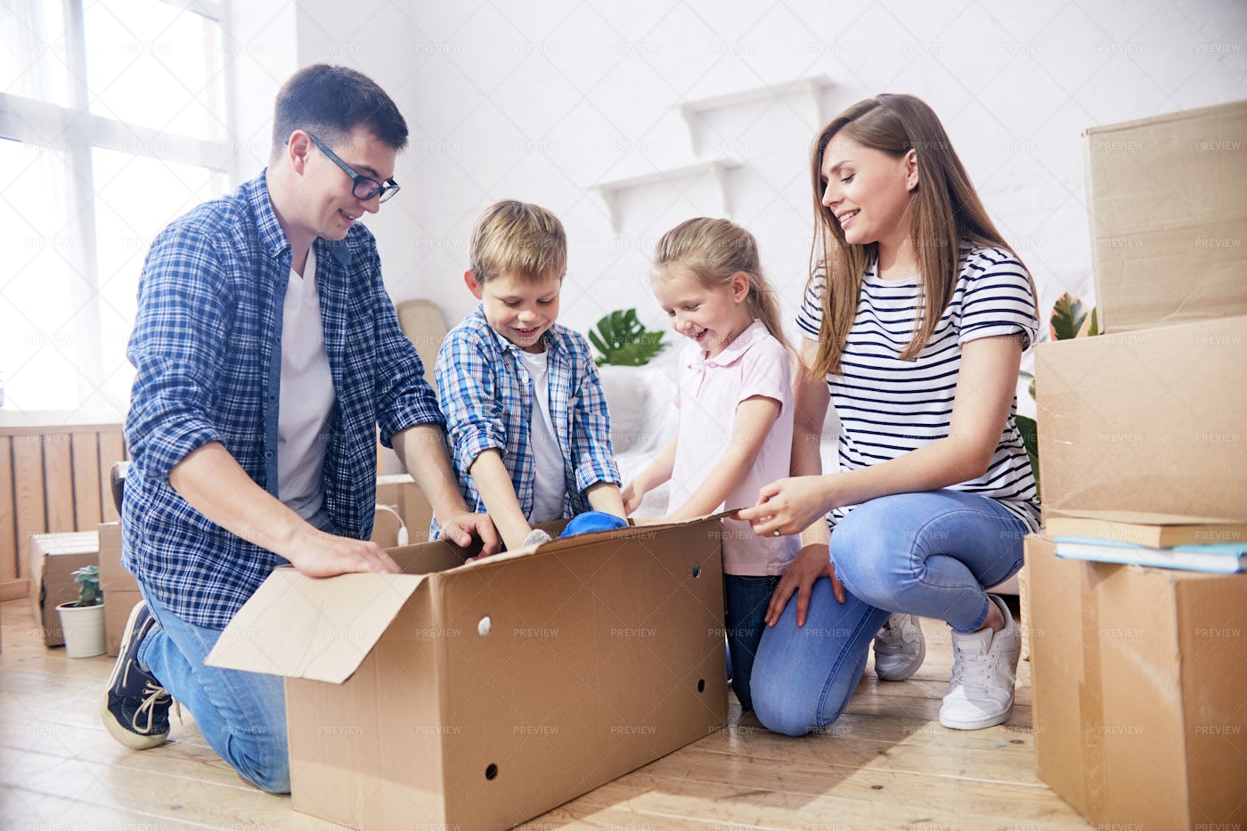 Unpacking Moving Boxes...: Stock Photos
