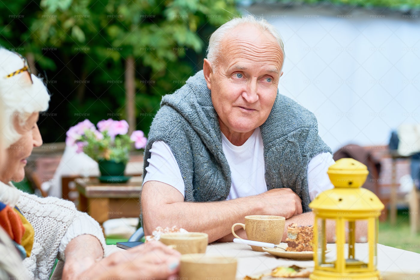 Senior Man Surrounded By Friends: Stock Photos
